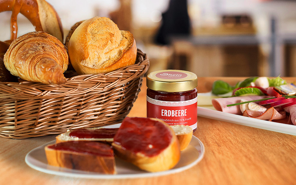 Teller mit Dhein Früchtchen Marmelade - Bäckerei Dhein